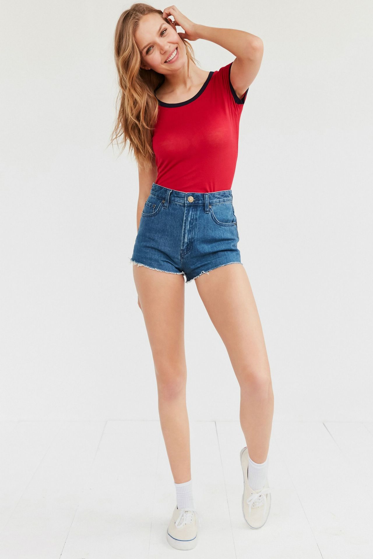 Josephine Skriver in denim shorts and red top for Urban Outfitters ...