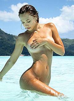 Alexis Ren naked cover her breasts