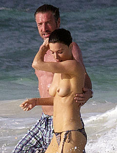 Jaime Murray topless on a beach paparazzi photo