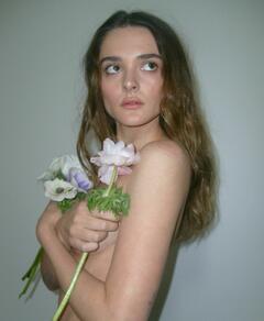 Charlotte Lawrence topless but coeverd for Paris Fashion Week Photo Diary for Nylon Magazine - January 2025