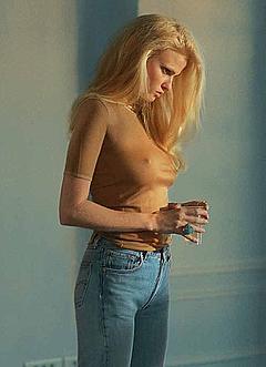 Busty blonde Lara Stone in jeans and tight top for Marie Claire