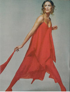 American model and actress Lauren Hutton in red dress