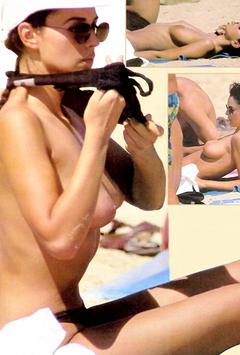 Itaian actress Monica Bellucci changing on a beach shows her nude tits paparazzi collage